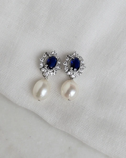 Aros circonitas con cristal azul y perla natural