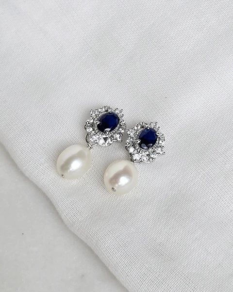 Aros circonitas con cristal azul y perla natural