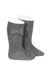 Calcetines altos con relieve y lazo
