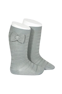 Calcetines altos con relieve y lazo