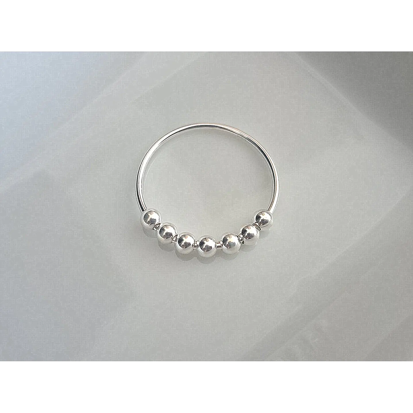 Anillo 7 esferas giratorias 1