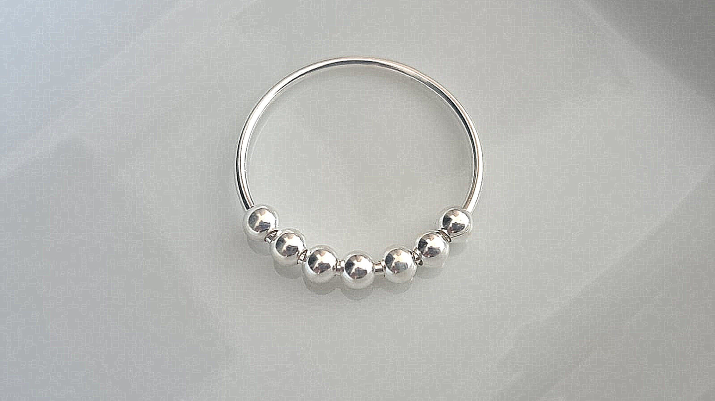 Anillo 7 esferas giratorias 1