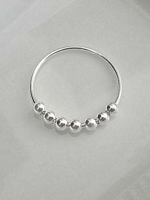 Anillo 7 esferas giratorias