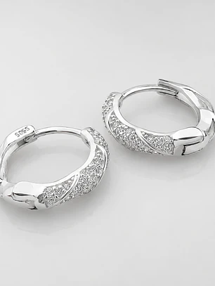 Argollas huggies entorchadas con circones en plata 925