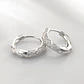 Argollas huggies entorchadas con circones en plata 925 - Miniatura 2