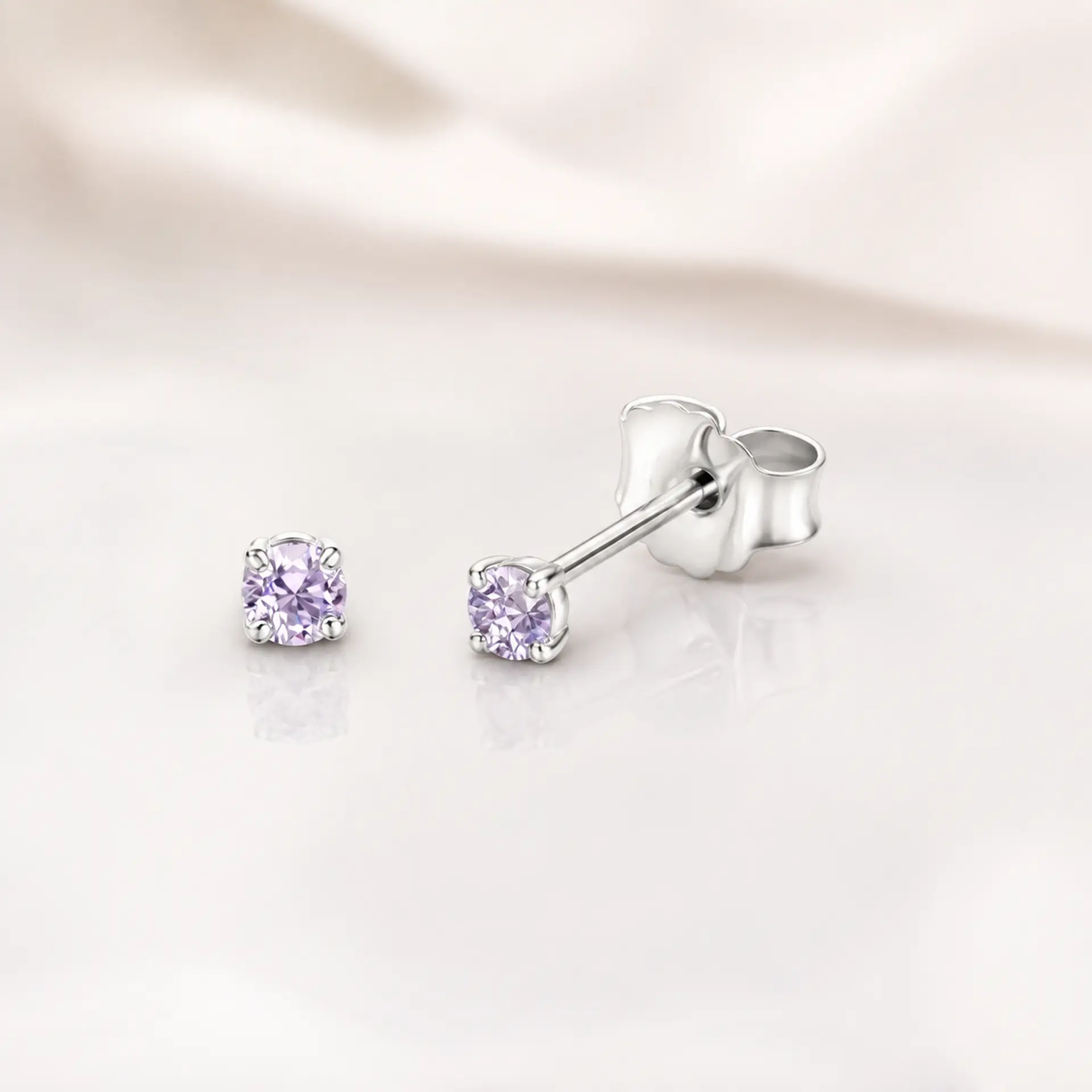 Aros punto violeta en plata 925 1