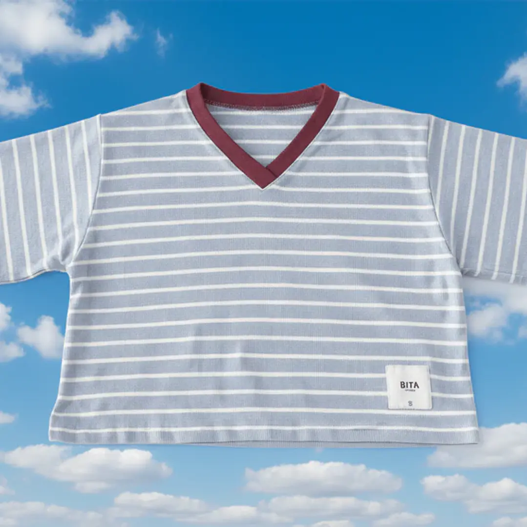 Polera Oversize “Be Kind to All Kinds” Celeste — BITA 1