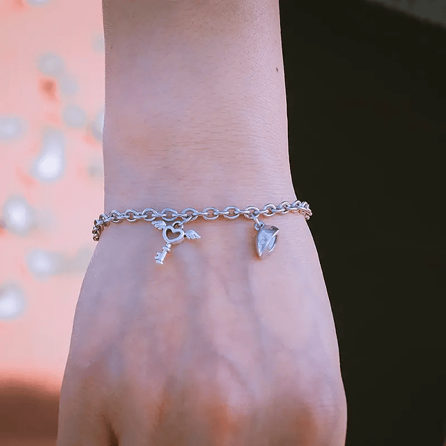 Pulsera en acero inoxidable magnética en forma de corazón para parejas dije de corazón y llave