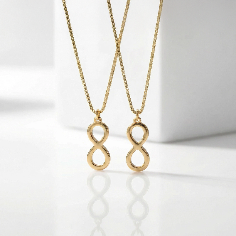 Collar de acero inoxidable para parejas con dije de infinito  1