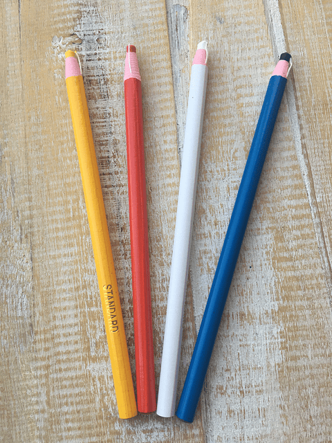 Lápiz tiza con hilo