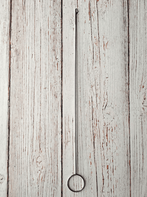 Gancho para voltear telas