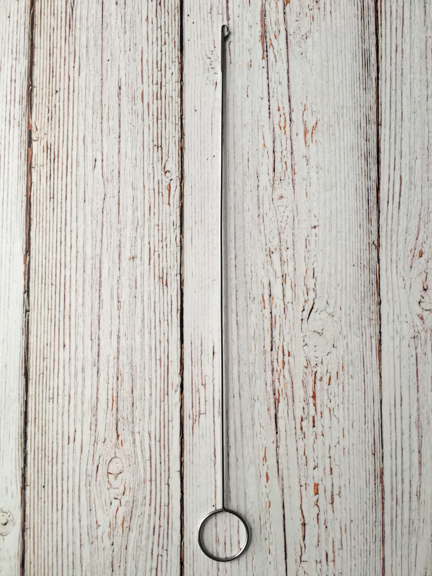 Gancho para voltear telas 1