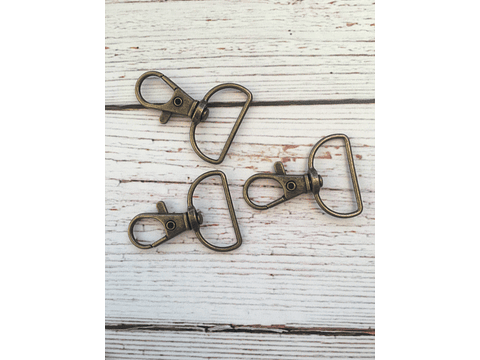 Mosquetones metálicos bronce (6und)