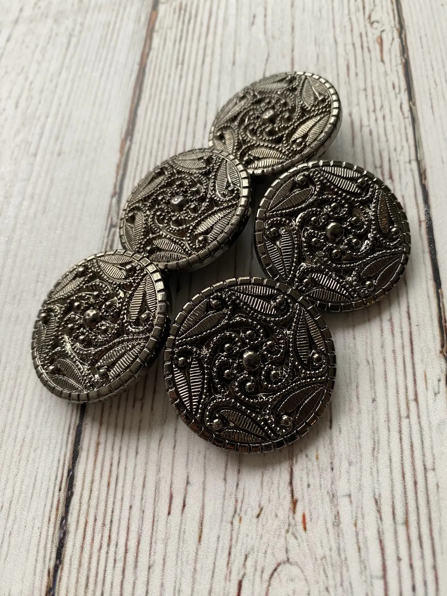 Botón Flor Espiral color Acero 1