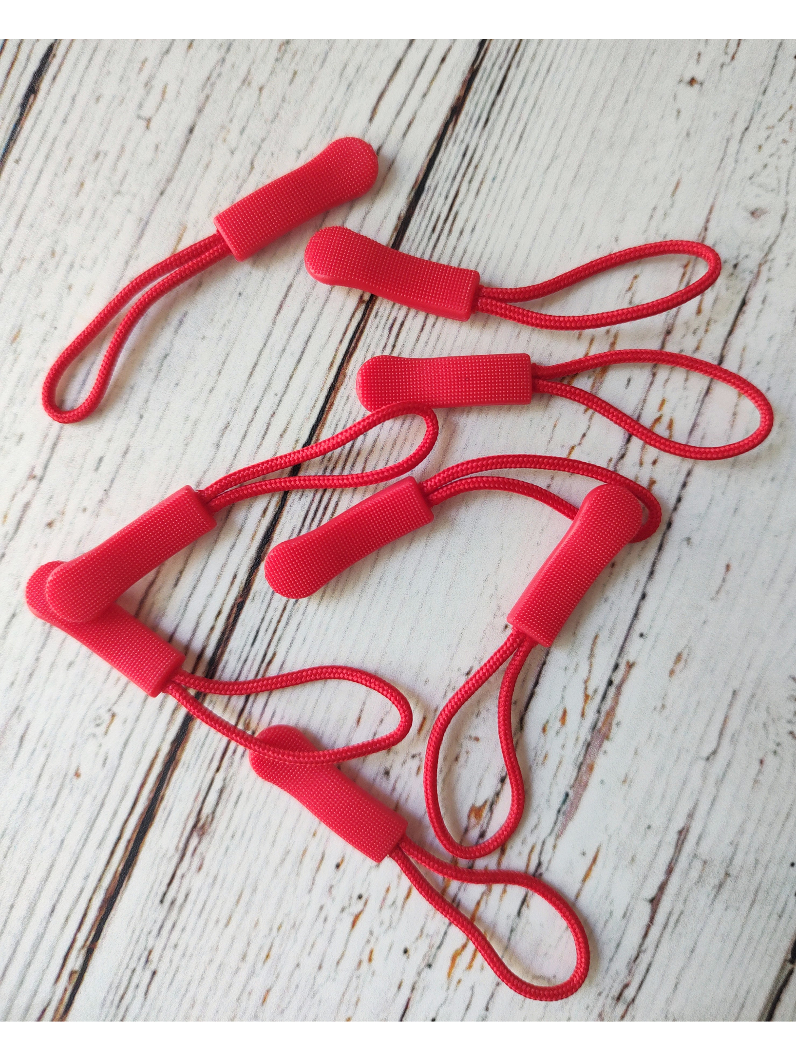 Tirador para cierre (10und) 9