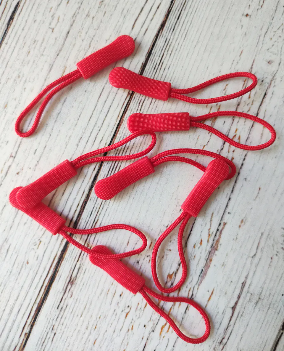 Tirador para cierre (10und) 9