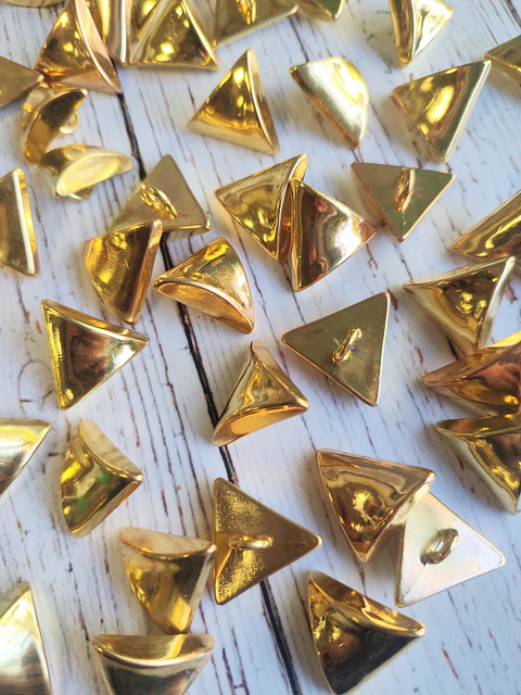 Botones Triángulos dorados unidad