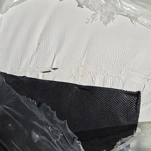 2da Selección.- Silla Eames Capitonné Blanca 