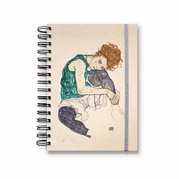 Cuaderno Mujer sentada con la pierna doblada 