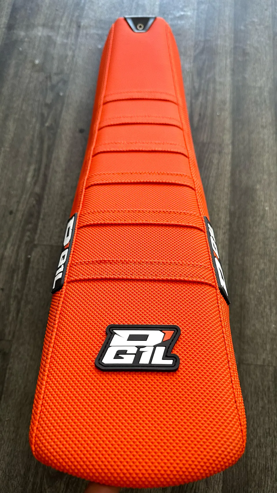 FUNDA DE ASIENTO DG1L KTM 20-25 NARANJO  1