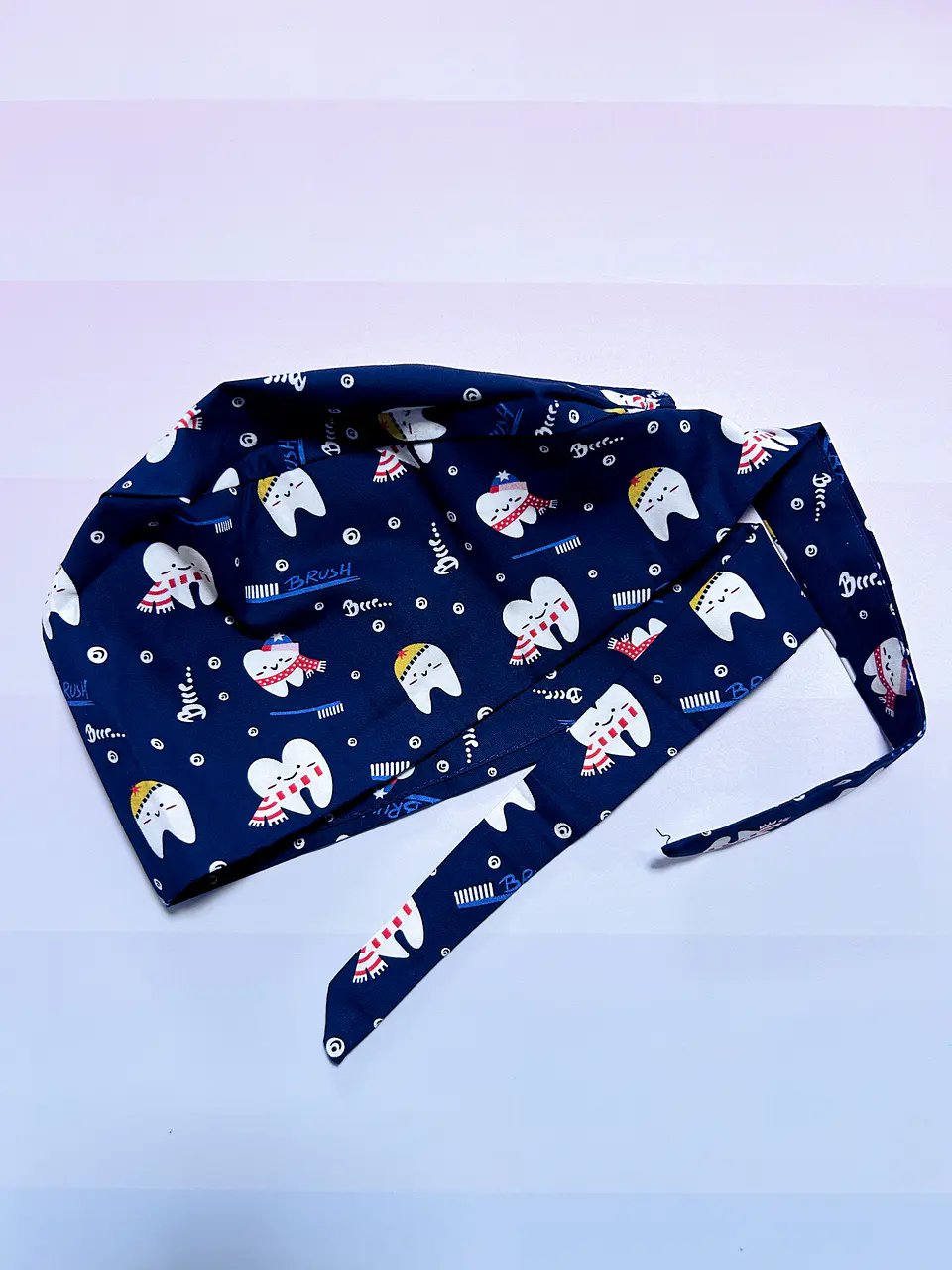 Gorro clínico dientes fondo azul marino 1