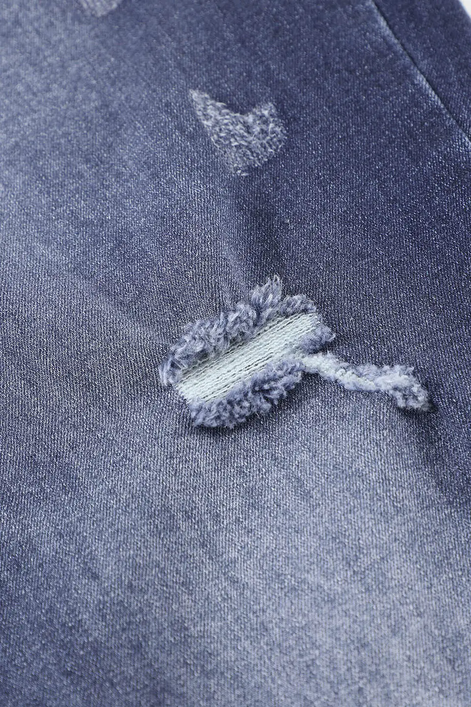 Jeans JE007 flequillos en bota 15