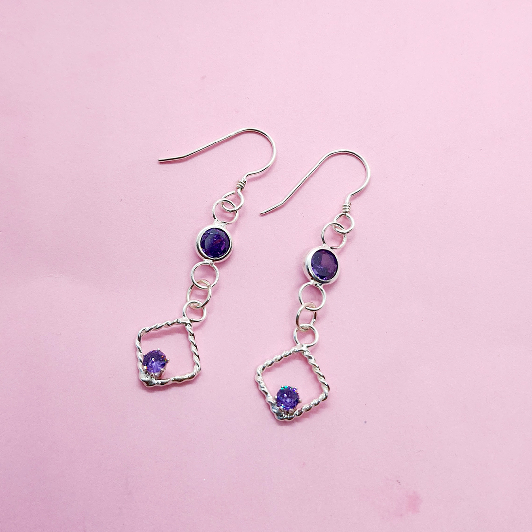 Aros Rombos circón lila 1