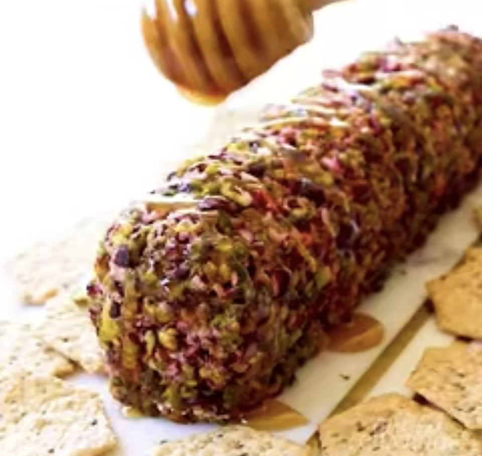 Rolls de queso crema  con cramberries , Pistacho y miel 1