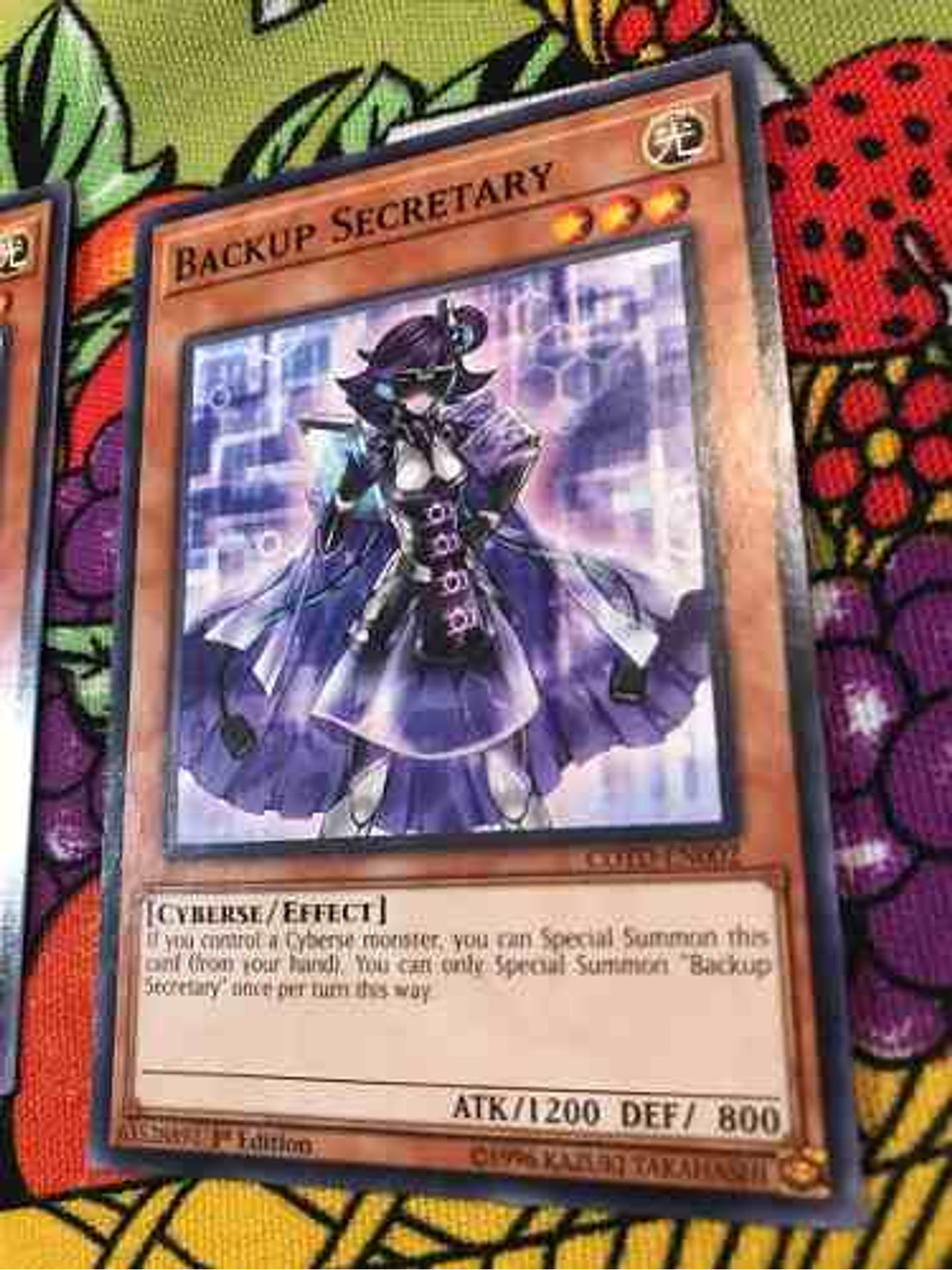 Backup Secretary - cotd-en002 - Common 1st Edition 1