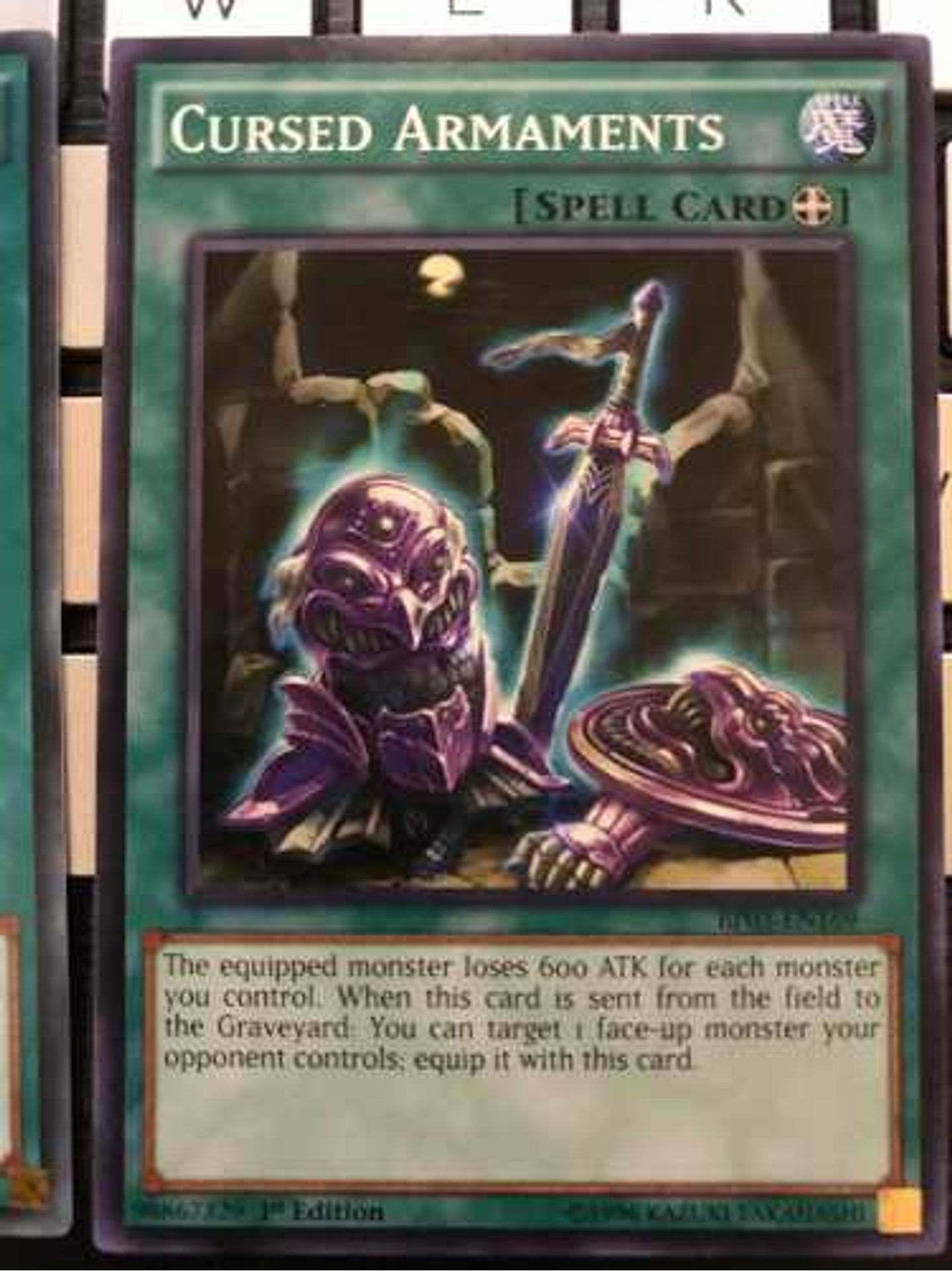 Cursed Armaments - bp03-en169 - Common 1st Edition 1