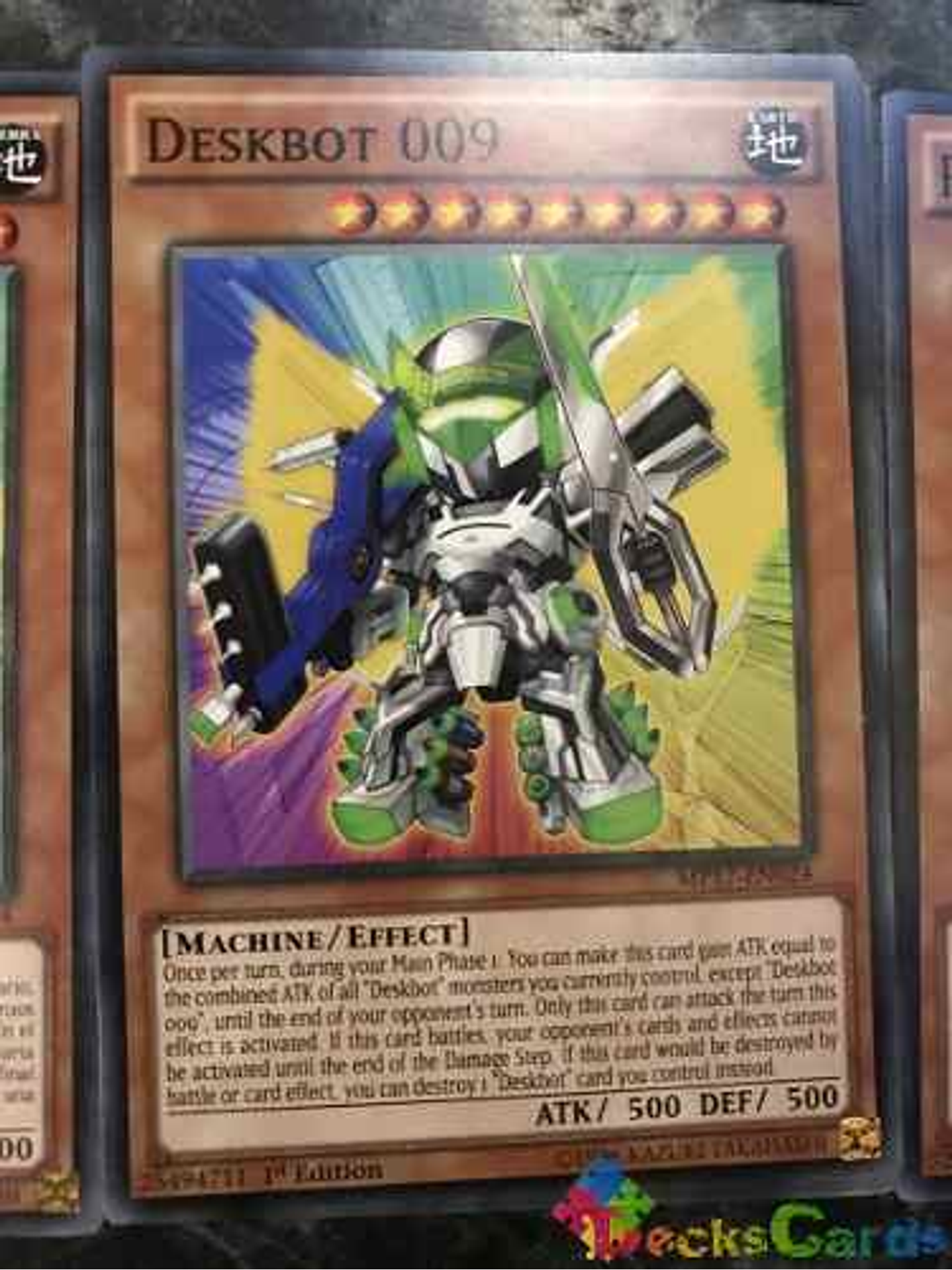 Deskbot 009 - mp17-en024 - Common 1st Edition 2