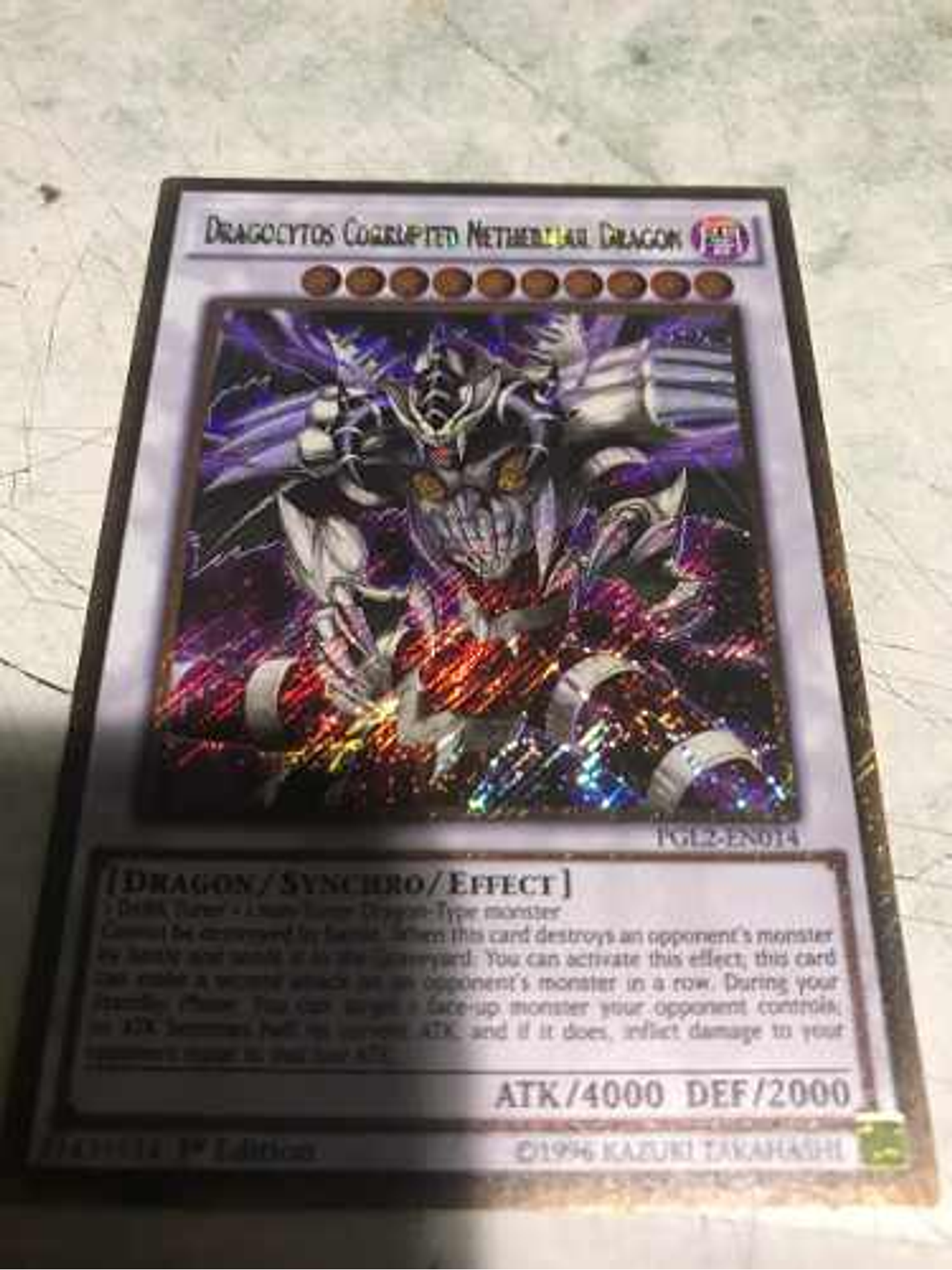 Dragocytos Corrupted Nethersoul Dragon - PGL2-EN014 - Gold Secret Rare 1st Edition 1
