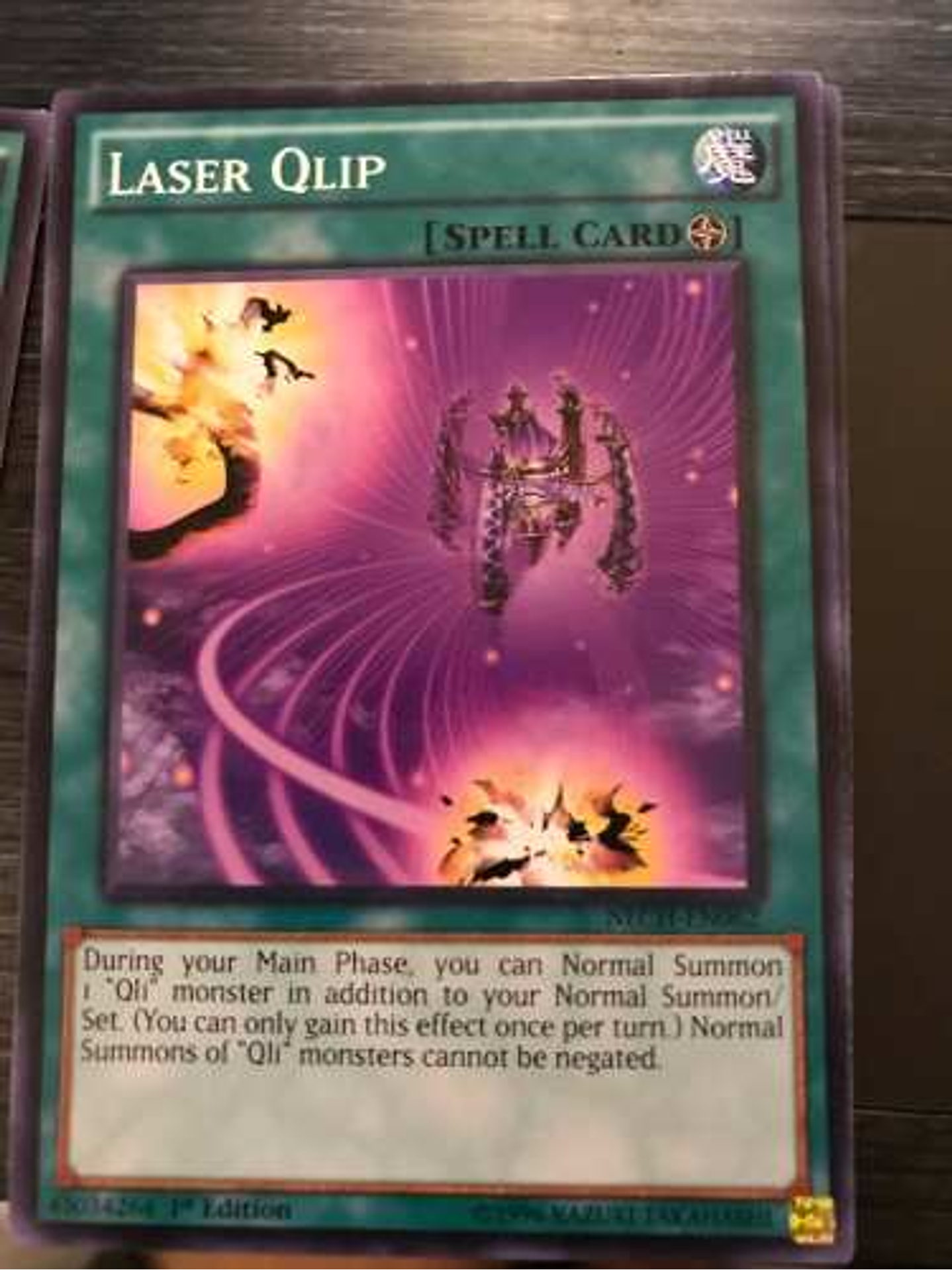 Laser Qlip - nech-en062 - Common 1st Edition 1