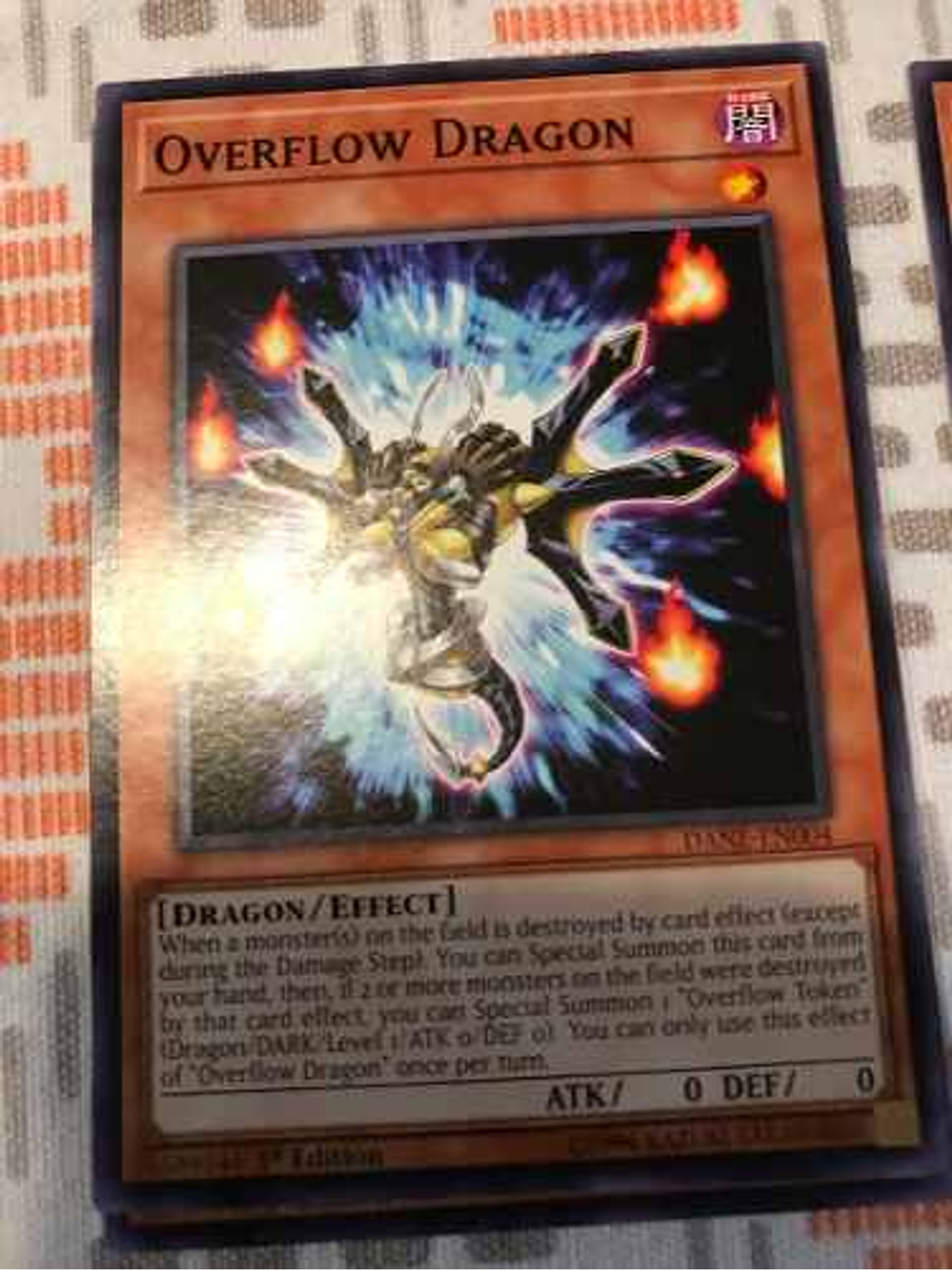 Overflow Dragon - dane-en004 - Common 1st Edition 2
