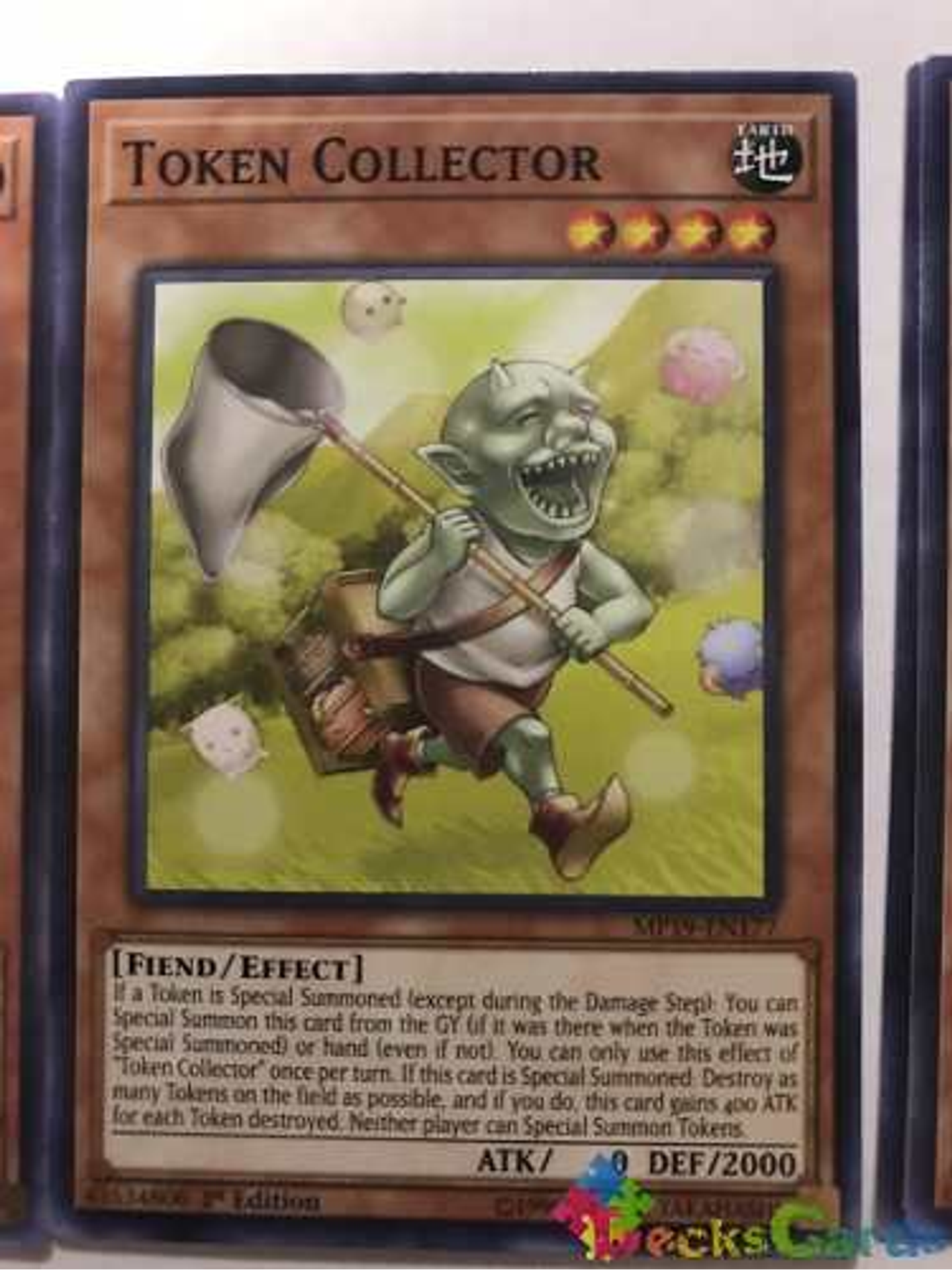 Token Collector - mp19-en177 - Common 1st Edition 1