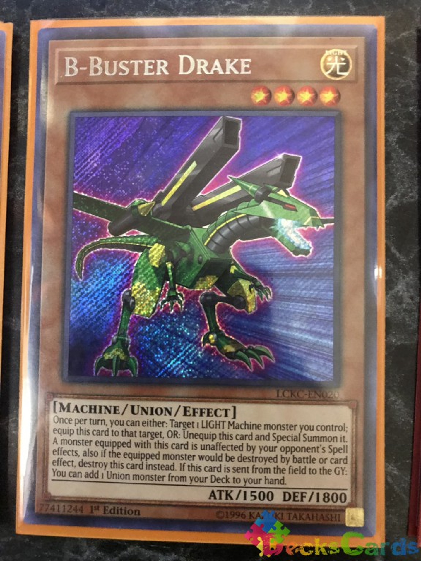 B-Buster Drake - LCKC-EN020 - Secret Rare 1st Edition 1
