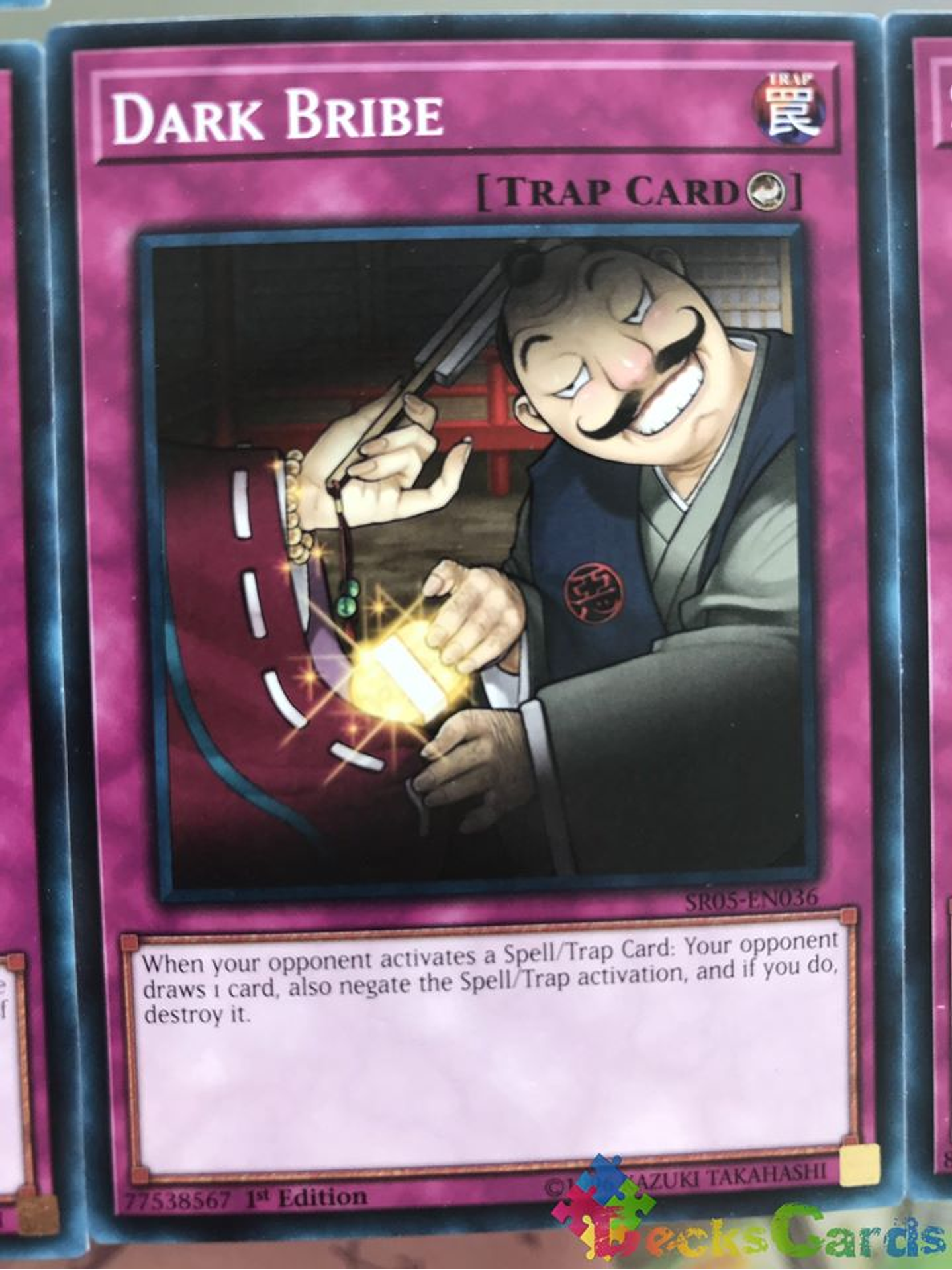 Dark Bribe - SR05-EN036 - Common 1st Edition 1