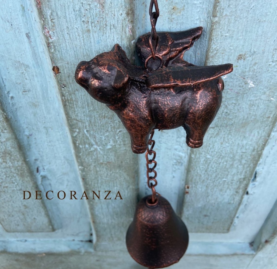 Campana Cerdo Alado