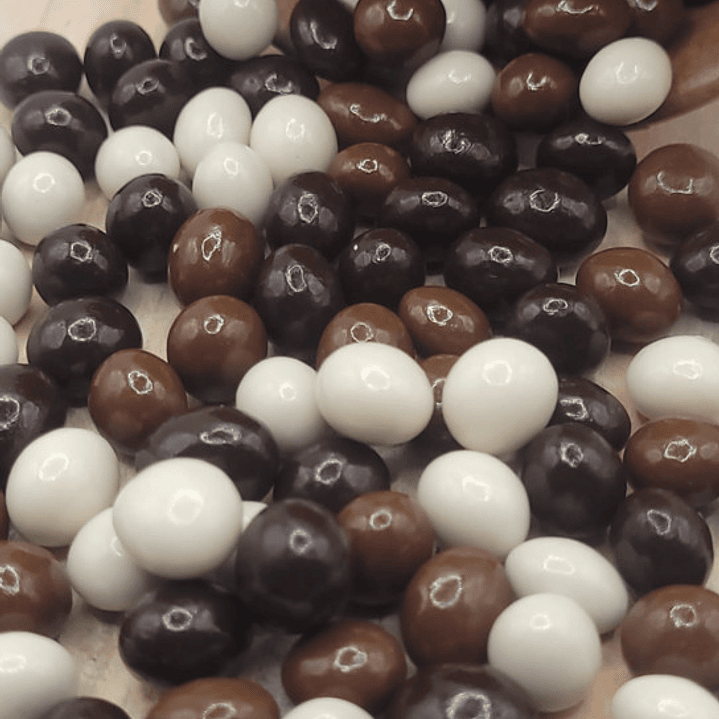 Grano Café bañado en tres Chocolates 3