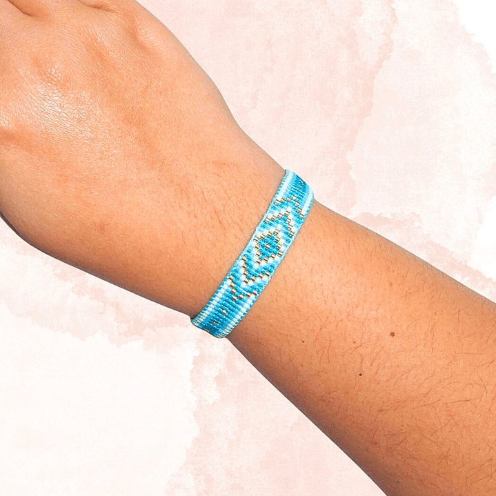 PULSERA FLECHAS CELESTE Y DORADO 2