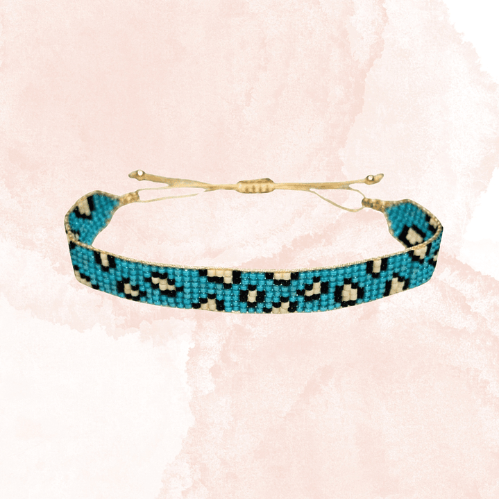 PULSERA  LEOPARDO TURQUESA Y MARFIL 1