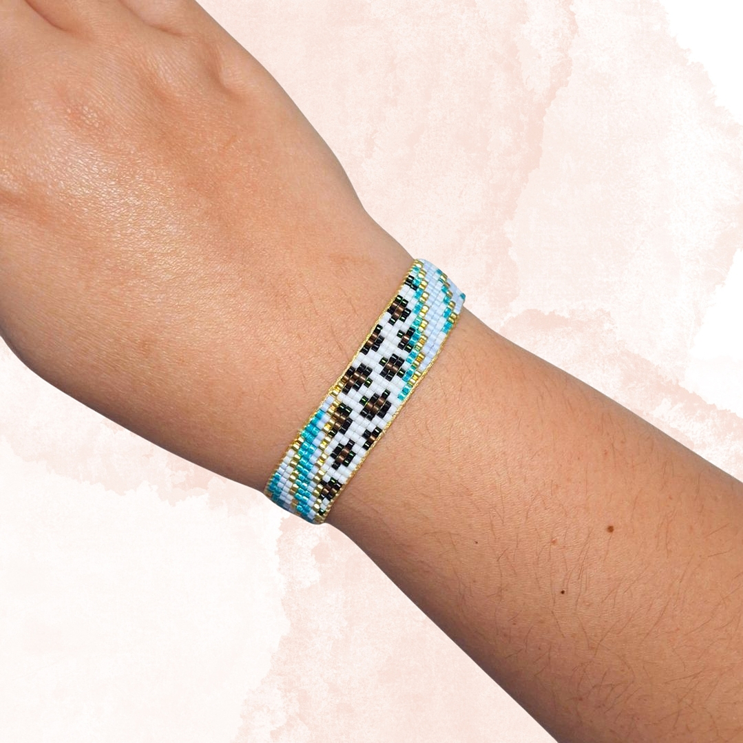 PULSERA  LEOPARDO TURQUESA Y DORADO 2