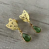 LEOPARDOS Y PIEDRA