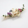 TOCADO FLORAL CON TOQUES DORADOS