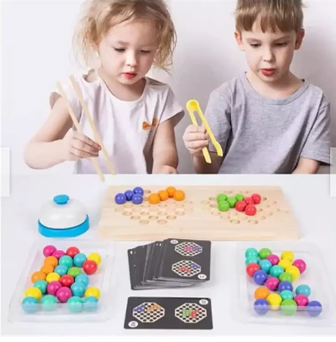 Juego de patrones y canicas dobles madera.