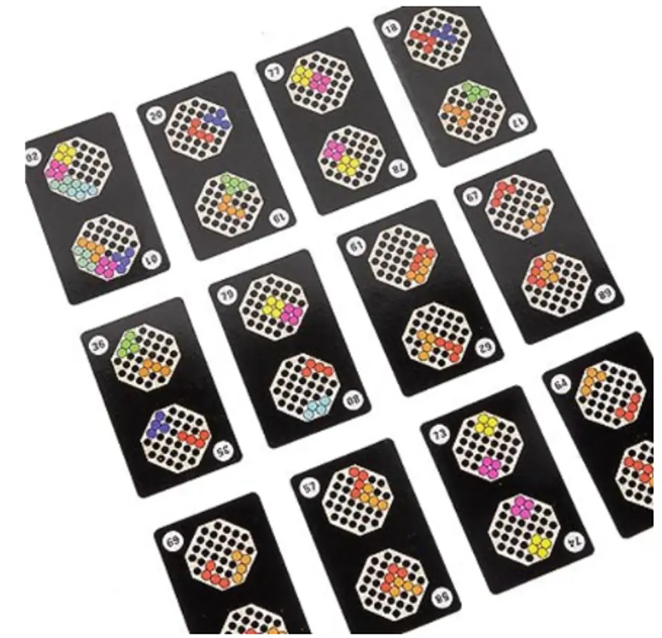 Juego de patrones y canicas dobles madera. 8