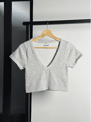 Top gris elasticado