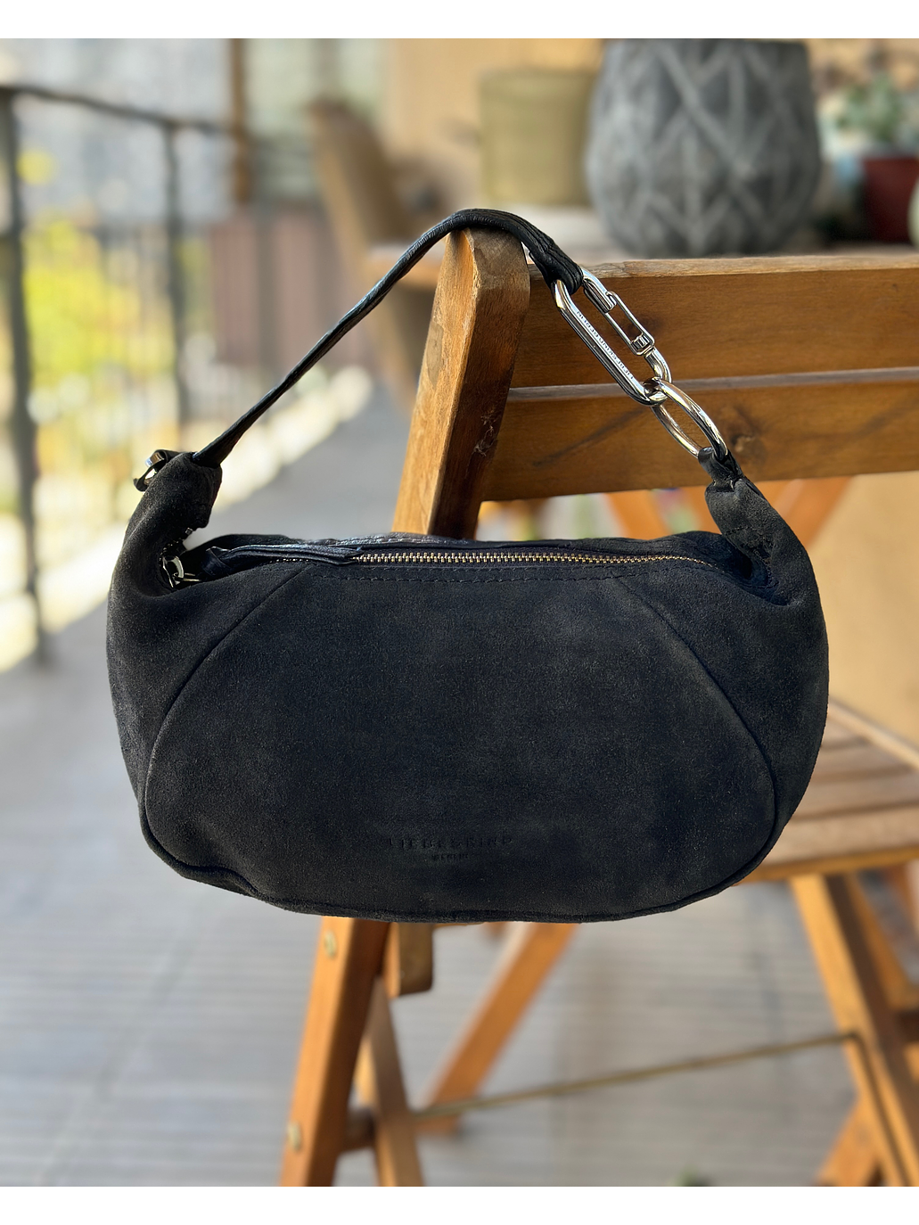 Cartera azul marino de cuero 6