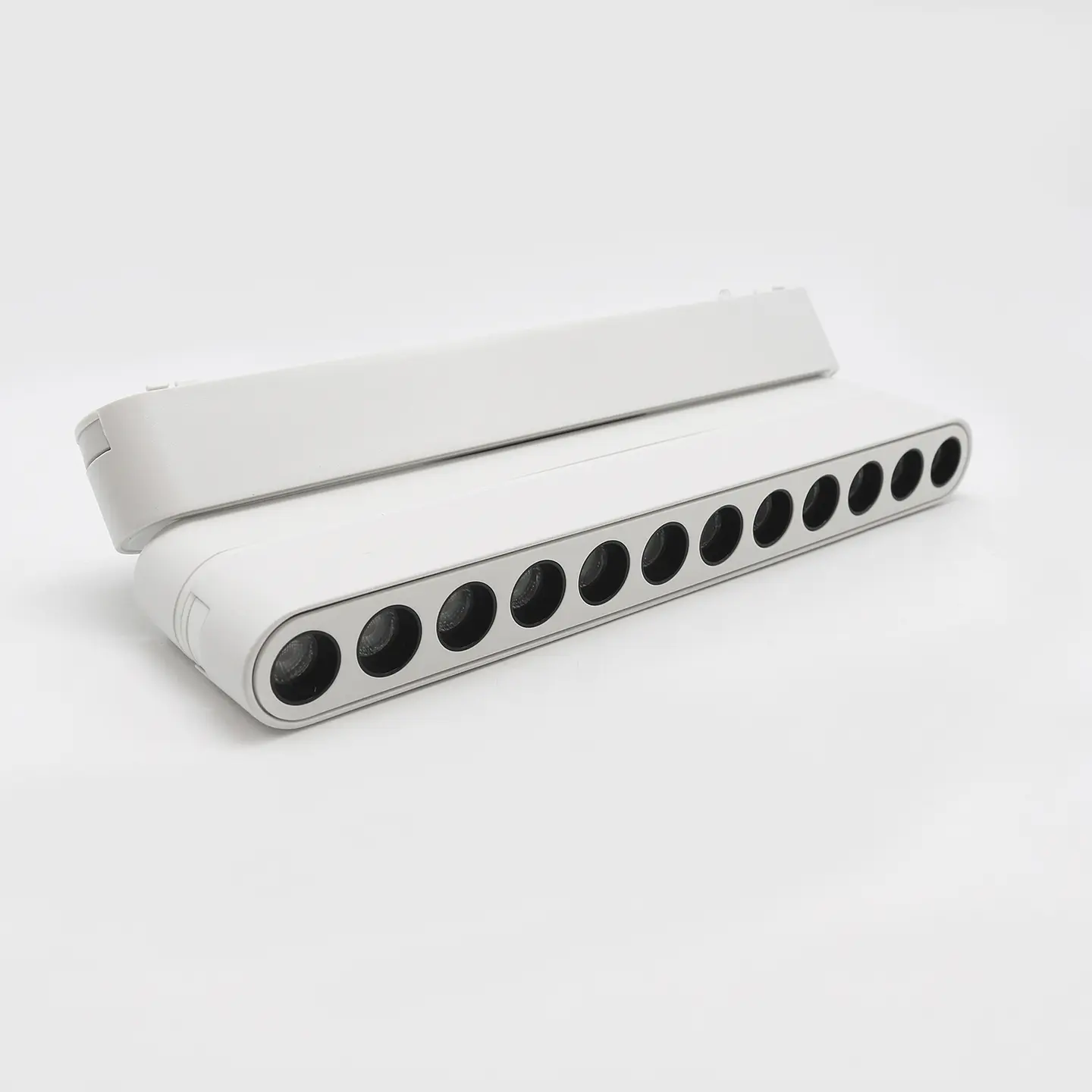 ACESSÓRIO ORIENTÁVEL BRANCO PARA PROJETOR LINEAR 12W 4
