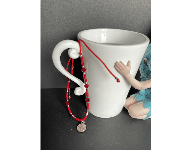 Pulsera San Benito en plata.